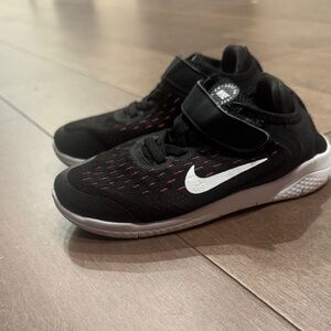 Nike Kids Black Sneakers with Red and White Accents